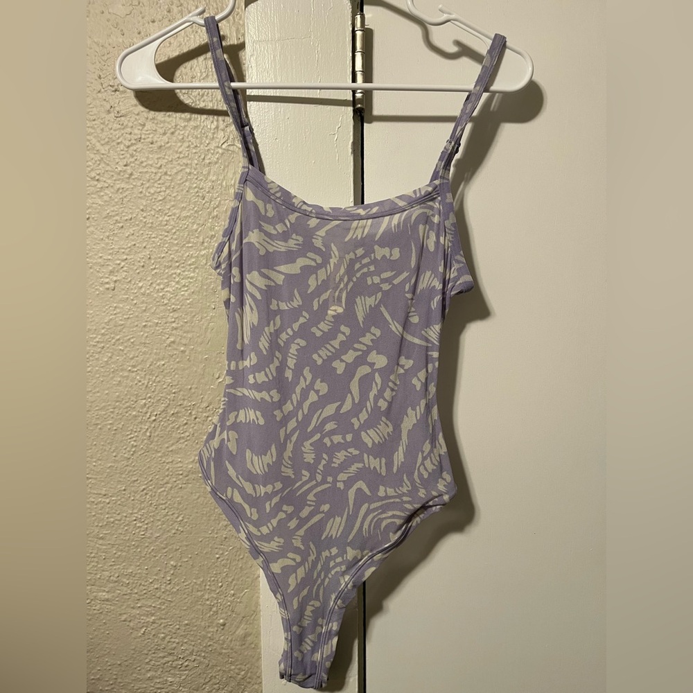 SKIMS Lilac Swirl Bodysuit in size Medium.